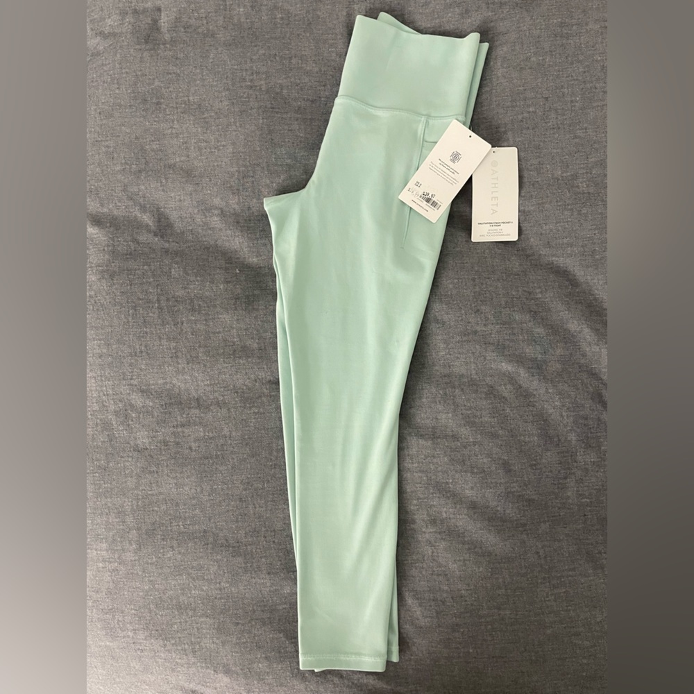 Brand new Athleta Salutation Stash 7/8 light green